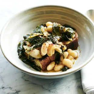 a bowl of beans and greens