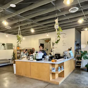 a coffee shop with people working