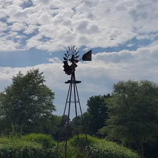 a windmill in the foreground