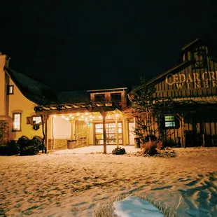 the front of the restaurant at night