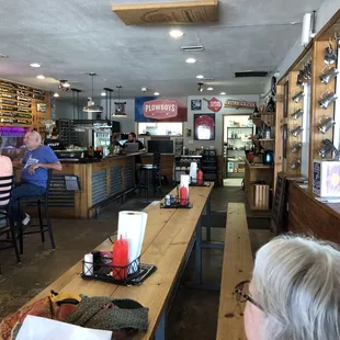 Inside, looking front to back. Bar to the left