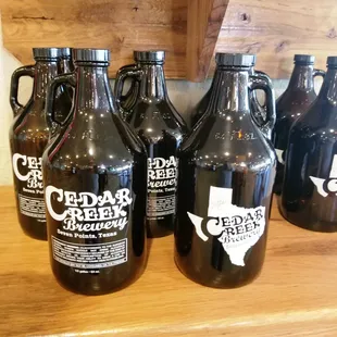 a row of beer jugs