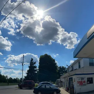 the sun shining through the clouds