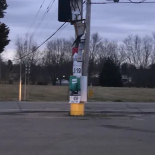 Street sign has seen better days