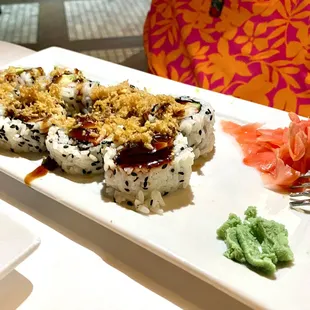 The Big Cali Roll of crab, cucumber, avocado, toasted sesame seeds, tempura crunchies, unagi sauce