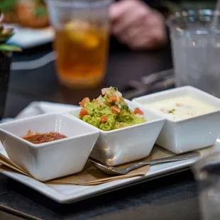 Housemade salsa, guacamole, and queso