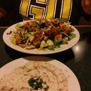 Grilled chicken on a fattouch salad