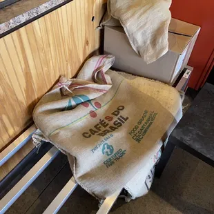 a coffee bag on a bench