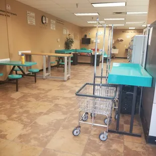 More washing machines and a kids play area in the back.