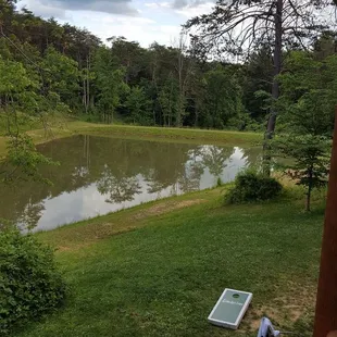 Pond next too large cabin