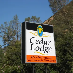a sign for cedar lodge