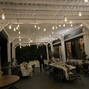 Outdoor dining area after a small wedding reception had ended.