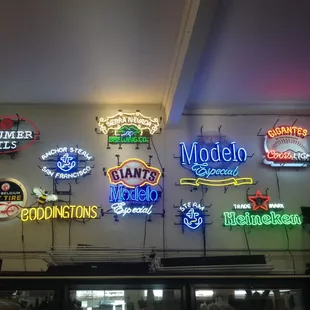 a wall of neon signs