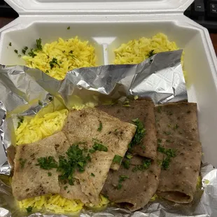 a meal in a styrofoam container