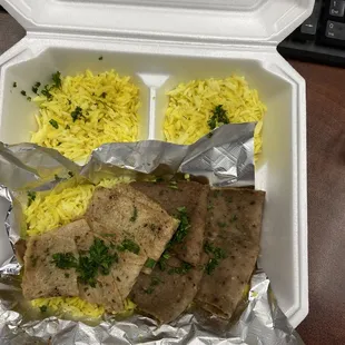 a meal in a styrofoam container