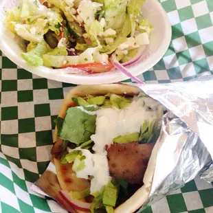 Lamb gyro and Greek salad, the lamb is cut very thinly and it's seasoned perfectly