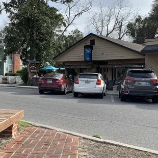 parking lot with cars parked in front