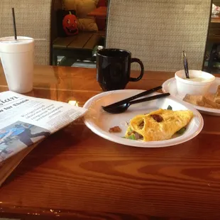 Coffee, omelette, grits, and toast!
