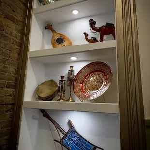 a display of decorative items on a shelf