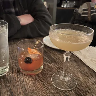 two cocktails on a table