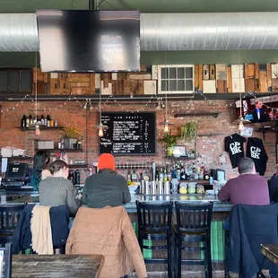 people sitting at the bar