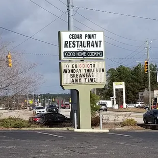 the sign for cedar point restaurant