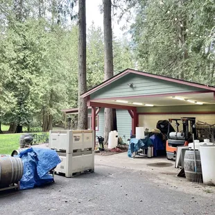 a garage with barrels and barrels