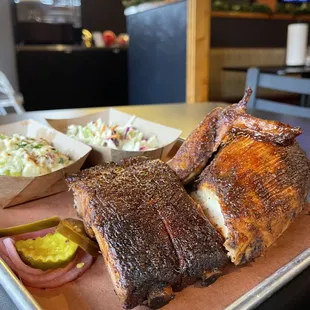 Pork Ribs and Chicken (white or dark) with your choice of 2 sides.