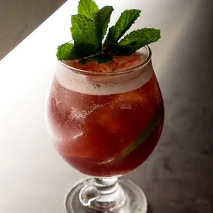 Rum Runner: Rum, cachaca, banana, blackberry.