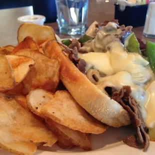 Cheese steak hoggie and home made chips $5.95