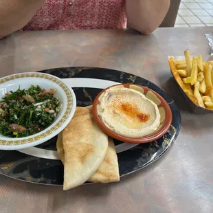 Pita, hummus and some tabbouli.