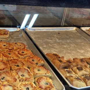 pans of pastries on display
