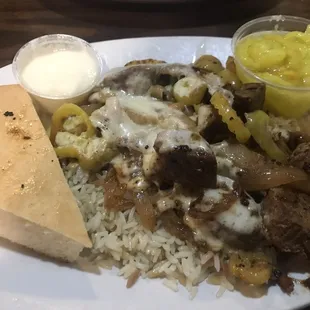 Cedars lamb over rice. Get it med rare. This is a good argument for best lamb at the best price in New Castle! The one with cheese.
