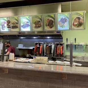 a man preparing food in the kitchen