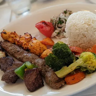 a plate of meat and vegetables