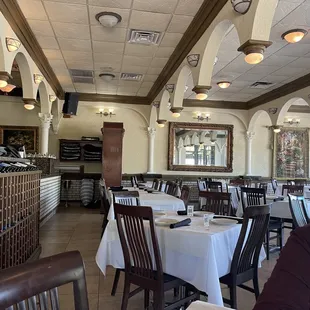 a restaurant with tables and chairs