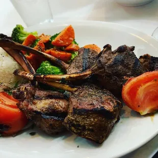 a plate of meat and vegetables