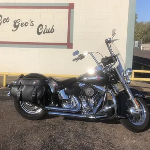 a motorcycle parked in front of a building