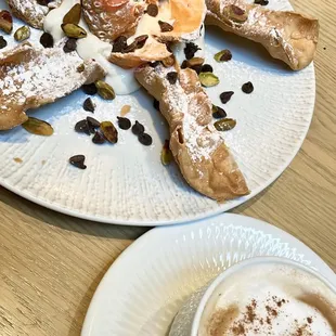 cannoli board with cappuccino