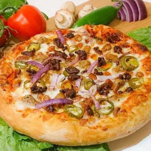 Try our delicious Mexican Pizza !