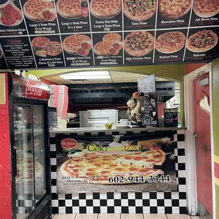 a display of pizzas