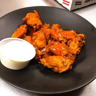 Try our wings cooked to perfection with just the right amount of sauce !