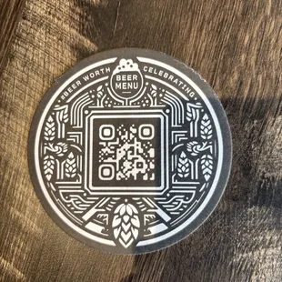 Reverse side of the coaster with a QR code for their beer menu