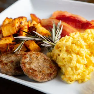 Continental Breakfast. Sausage, potatoes, eggs, and bacon. Offered through Celebration Catering