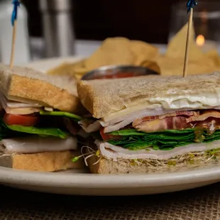 Turkey Club Sandwich, served with homemade chips and salsa