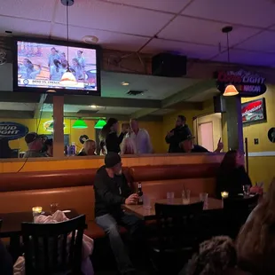 people sitting at the bar