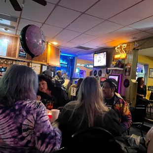 a crowd of people sitting at tables
