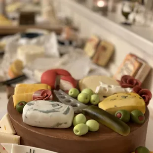 a birthday cake with cheese and fruit