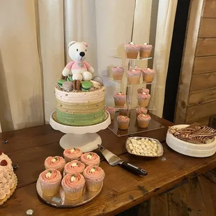 a variety of cupcakes and cakes