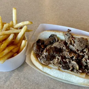 "Star of the Show" cheesesteak minus peppers and onions, with French fries